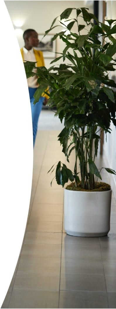 Customer service representative assists a client at a help desk.