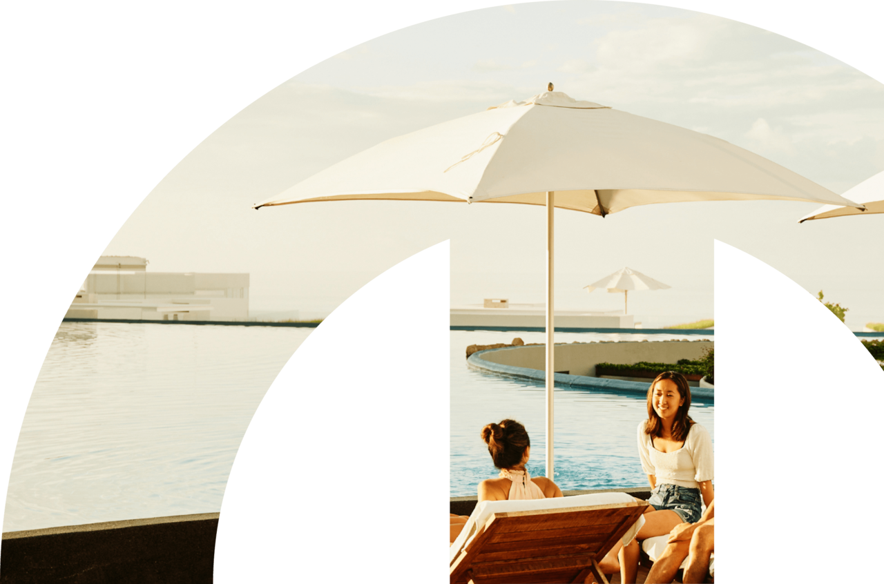 75 Years of Diners Club History promotional banner featuring a luxurious poolside setting with people relaxing under umbrellas.